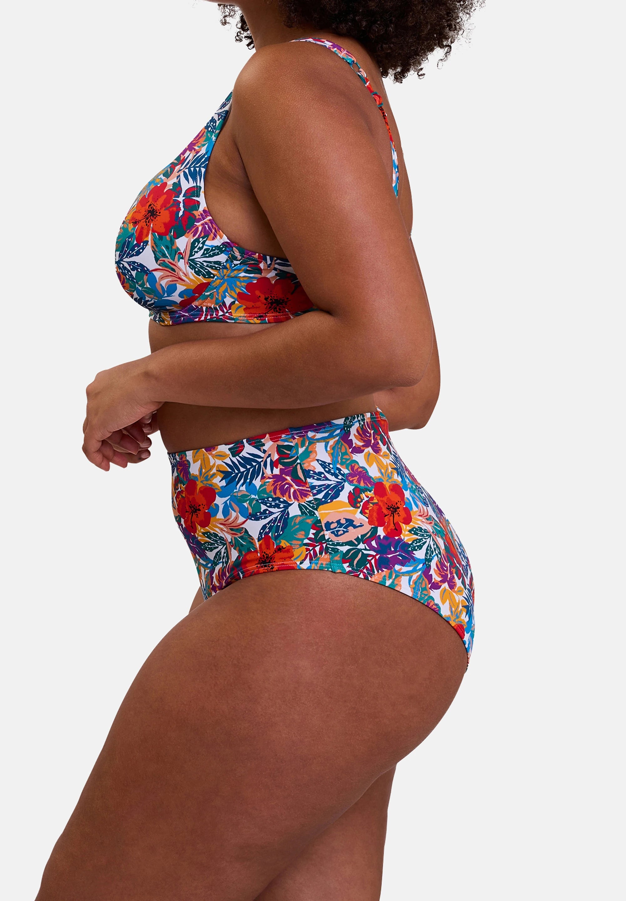Curaçao plunging swimwear top in multicolored tropical print – side view