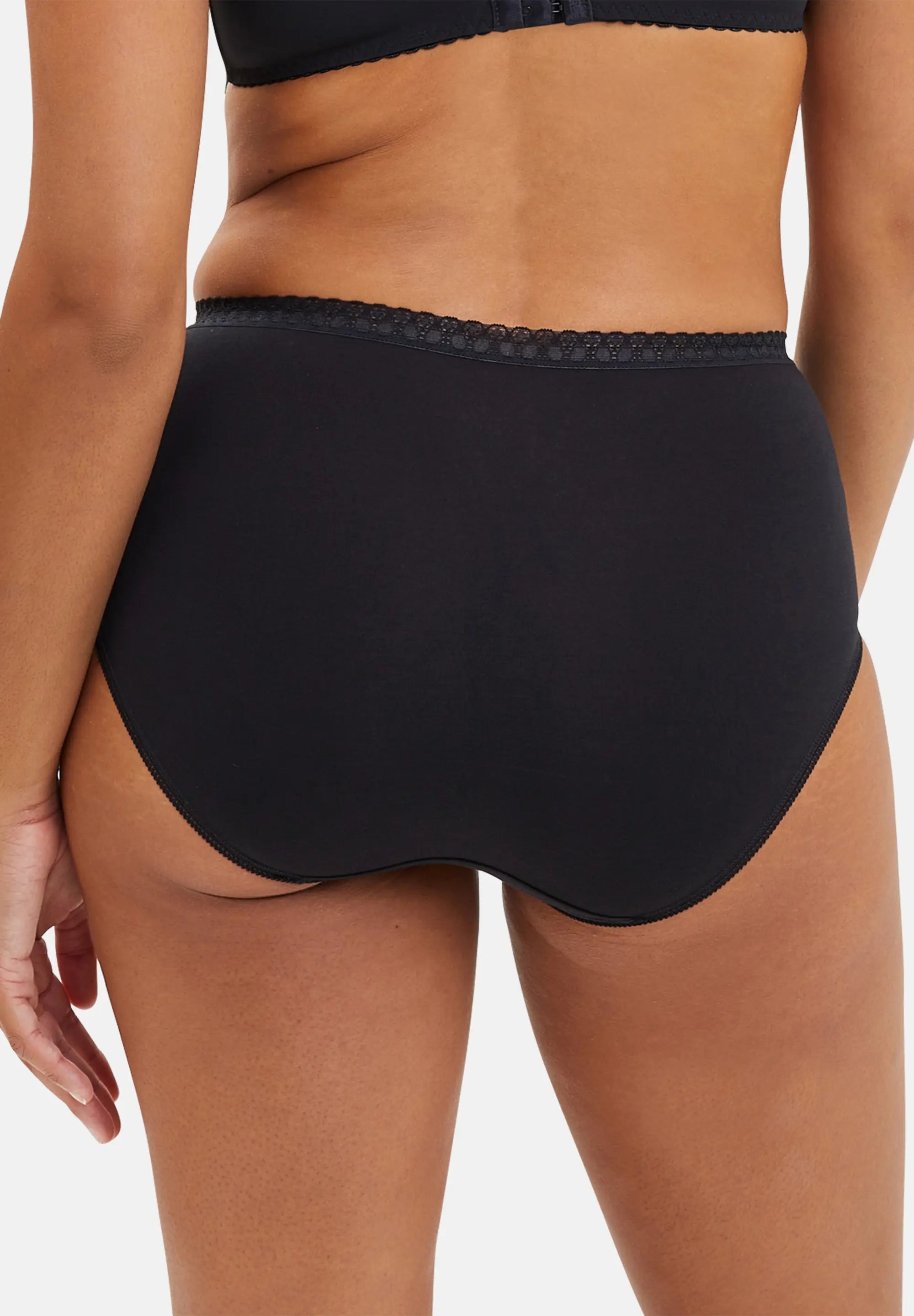 Slip femme, en coton, de couleur noire - vu de dos