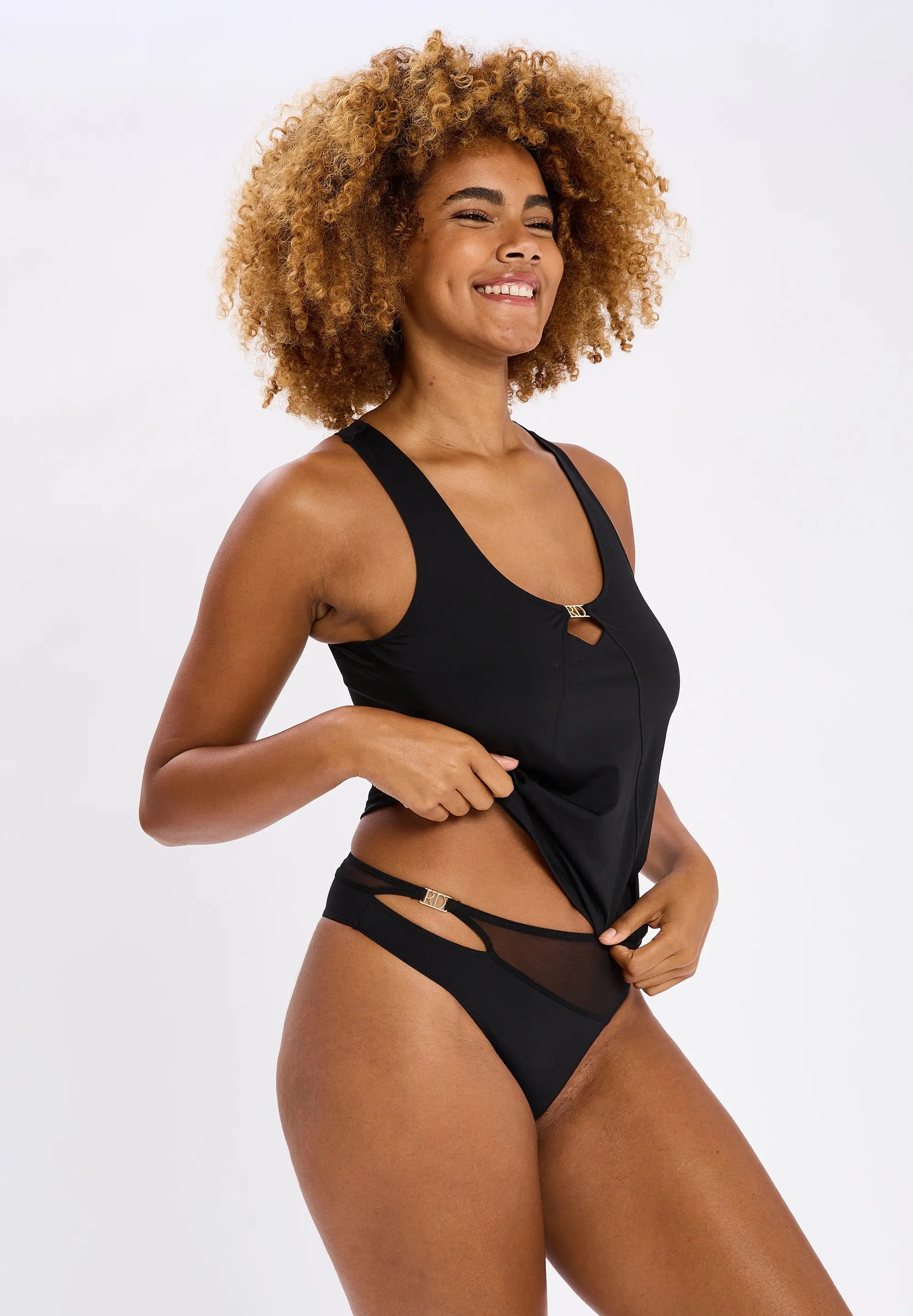 Tanga met hoge uitsnijding Romane Dicko Zwart